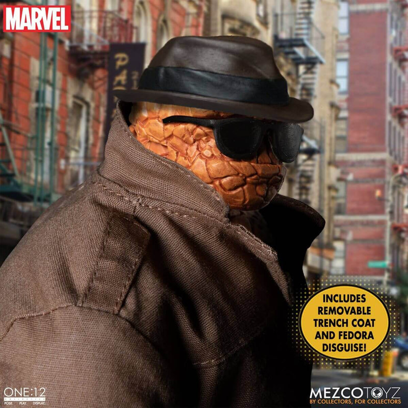 Mezco Toyz Fantastic Four One:12 Collective Deluxe Steel Boxed Set, Closeup right side view with trench coat, fedora and sunglasses.