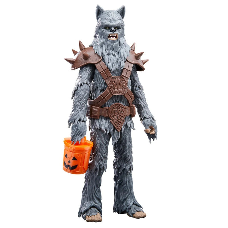 Star Wars The Black Series Halloween Wookie and Bogling 6-Inch Action Figure holding jack o lantern pail.