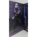 NECA Universal Monsters x Teenage Mutant Ninja Turtles Ultimate Donatello as The Invisible Man 7″ Scale Action Figure, Side of Package, Picture of Donatello in Stance